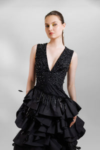 Sleeveless beaded gown with taffeta layers - HerTrove