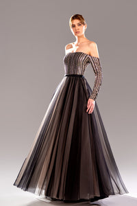 Her Trove-Off shoulder gown featuring pleated tulle skirt