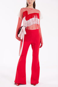 Sheer fringed top with flared crepe pants - HerTrove