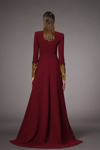 Her Trove-Crepe dress with gold feathers on hem and sleeves
